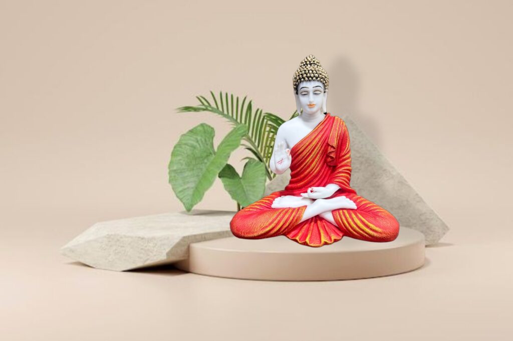 Red buddha meditating sculpture