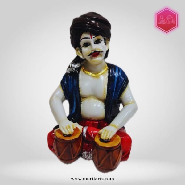 Decorative Rajasthani musician sculpture, adding a touch of Rajasthani flair to your living space.
