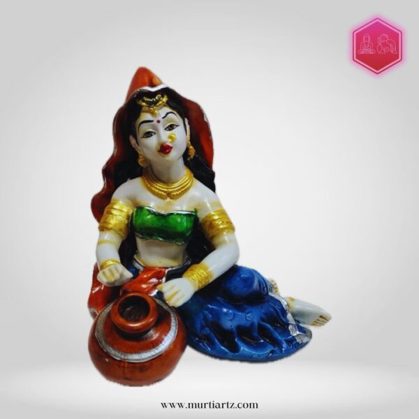 Decorative Rajasthani musician sculpture, adding a touch of Rajasthani flair to your living space.