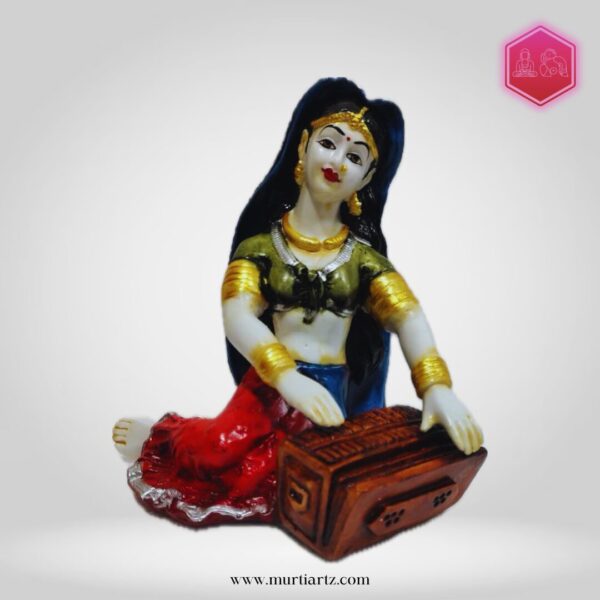Decorative Rajasthani musician sculpture, adding a touch of Rajasthani flair to your living space.