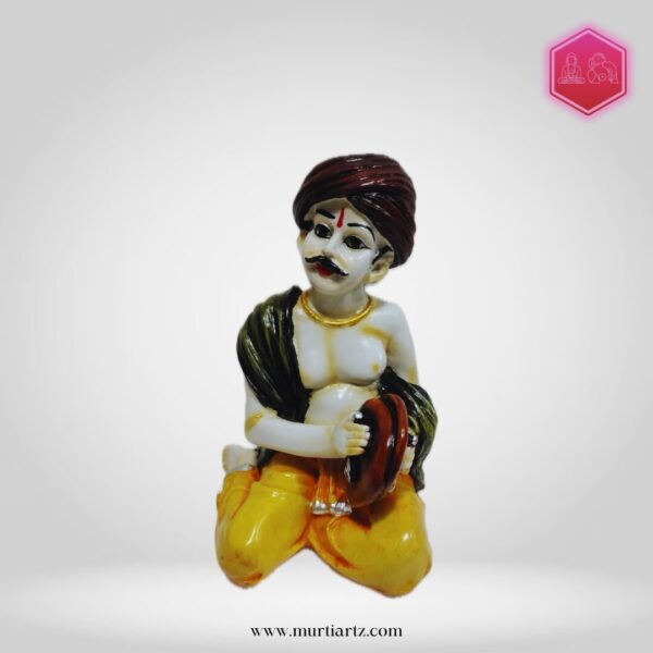Decorative Rajasthani musician sculpture, adding a touch of Rajasthani flair to your living space.