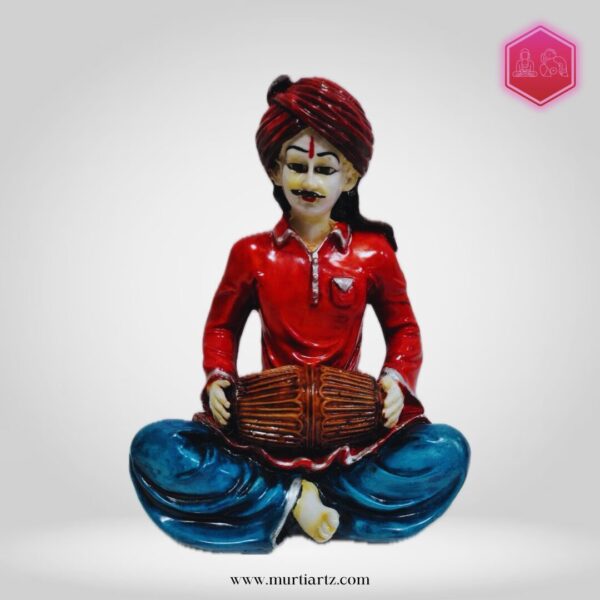 Decorative Rajasthani musician sculpture, adding a touch of Rajasthani flair to your living space.