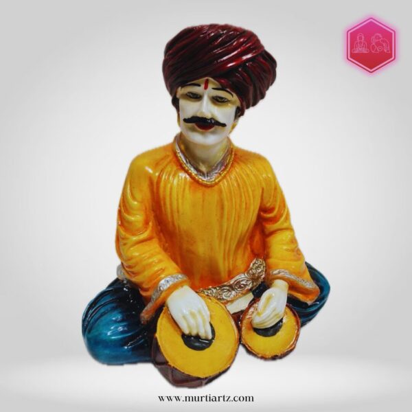 Decorative Rajasthani musician sculpture, adding a touch of Rajasthani flair to your living space.