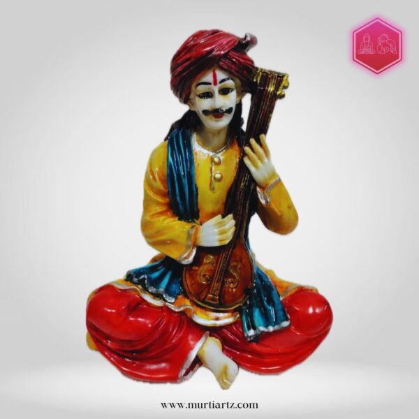 Decorative Rajasthani musician sculpture, adding a touch of Rajasthani flair to your living space.