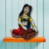 Decorative Rajasthani musician sculpture, adding a touch of Rajasthani flair to your living space.