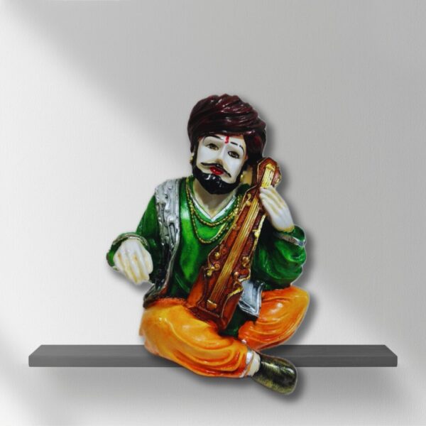 Decorative Rajasthani musician sculpture, adding a touch of Rajasthani flair to your living space.