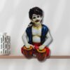 Decorative Rajasthani musician sculpture, adding a touch of Rajasthani flair to your living space.