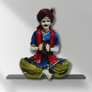 Decorative Rajasthani musician sculpture, adding a touch of Rajasthani flair to your living space.