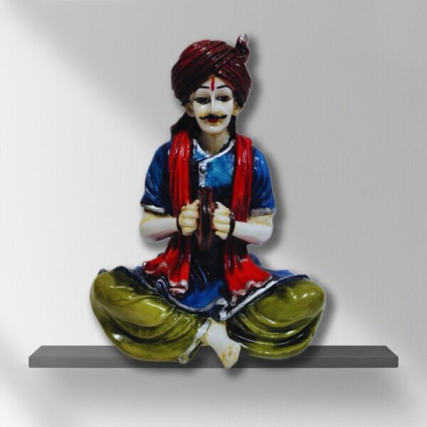 Decorative Rajasthani musician sculpture, adding a touch of Rajasthani flair to your living space.