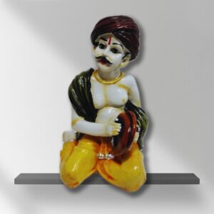 Decorative Rajasthani musician sculpture, adding a touch of Rajasthani flair to your living space.