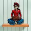 Decorative Rajasthani musician sculpture, adding a touch of Rajasthani flair to your living space.