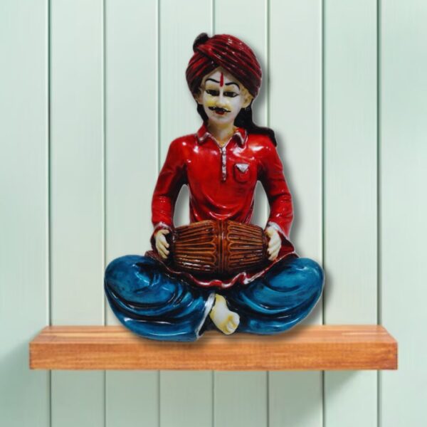 Decorative Rajasthani musician sculpture, adding a touch of Rajasthani flair to your living space.