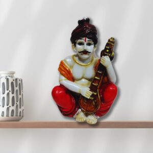 Decorative Rajasthani musician sculpture, adding a touch of Rajasthani flair to your living space.