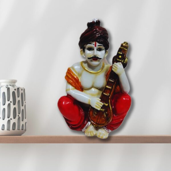 Decorative Rajasthani musician sculpture, adding a touch of Rajasthani flair to your living space.