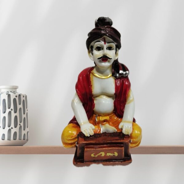 Decorative Rajasthani musician sculpture, adding a touch of Rajasthani flair to your living space.