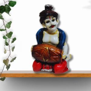 Decorative Rajasthani musician sculpture, adding a touch of Rajasthani flair to your living space.