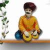 Decorative Rajasthani musician sculpture, adding a touch of Rajasthani flair to your living space.