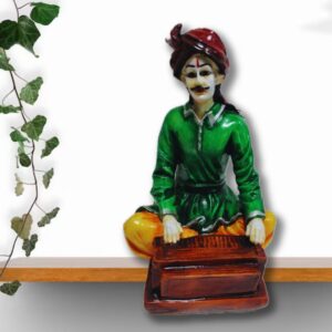 Decorative Rajasthani musician sculpture, adding a touch of Rajasthani flair to your living space.